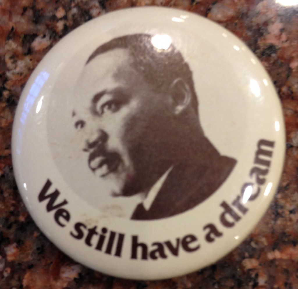 Political button depicting Dr. Martin Luther King, Jr.