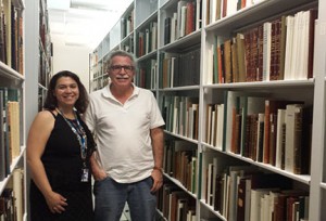 Marisol Ramos, Curator, with Luis Géigel at the stacks