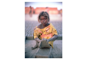 Bonded (slave) Child Laborer At A Brick Kiln