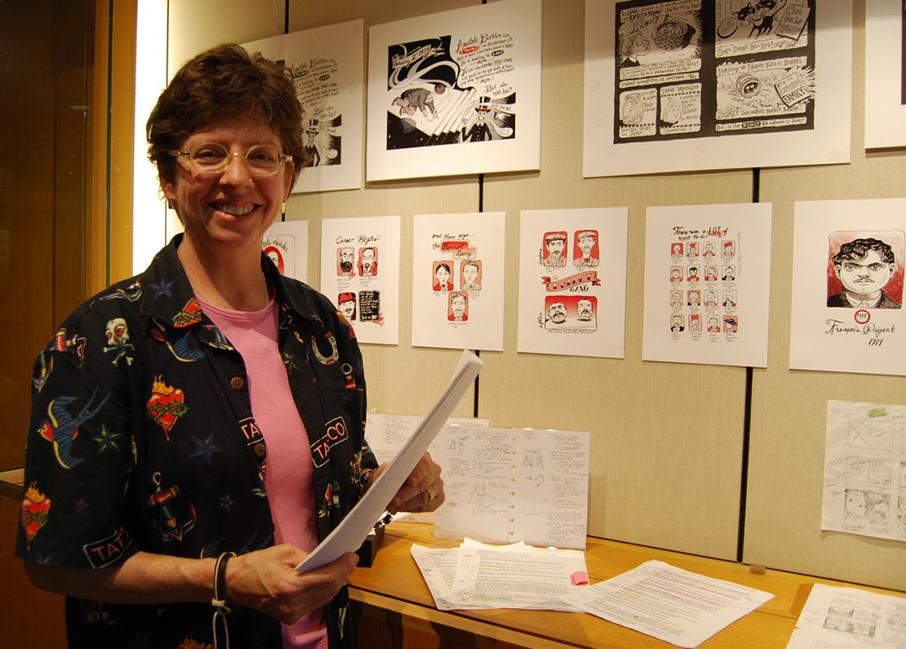 Cora Lynn Deibler with some of French executioner Anatole Deibler's "subjects" in her exhibit.